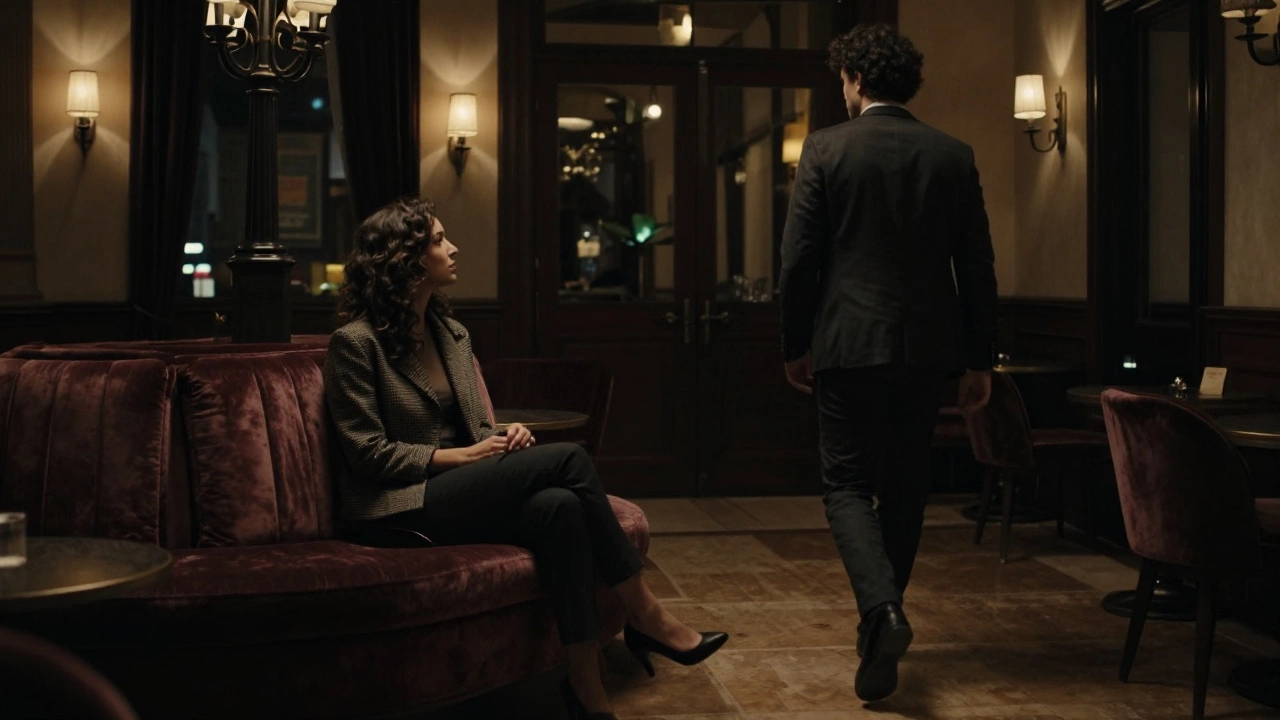 A woman waits calmly in a hotel lobby at night, a man approaching hesitantly, no physical contact, quiet tension.